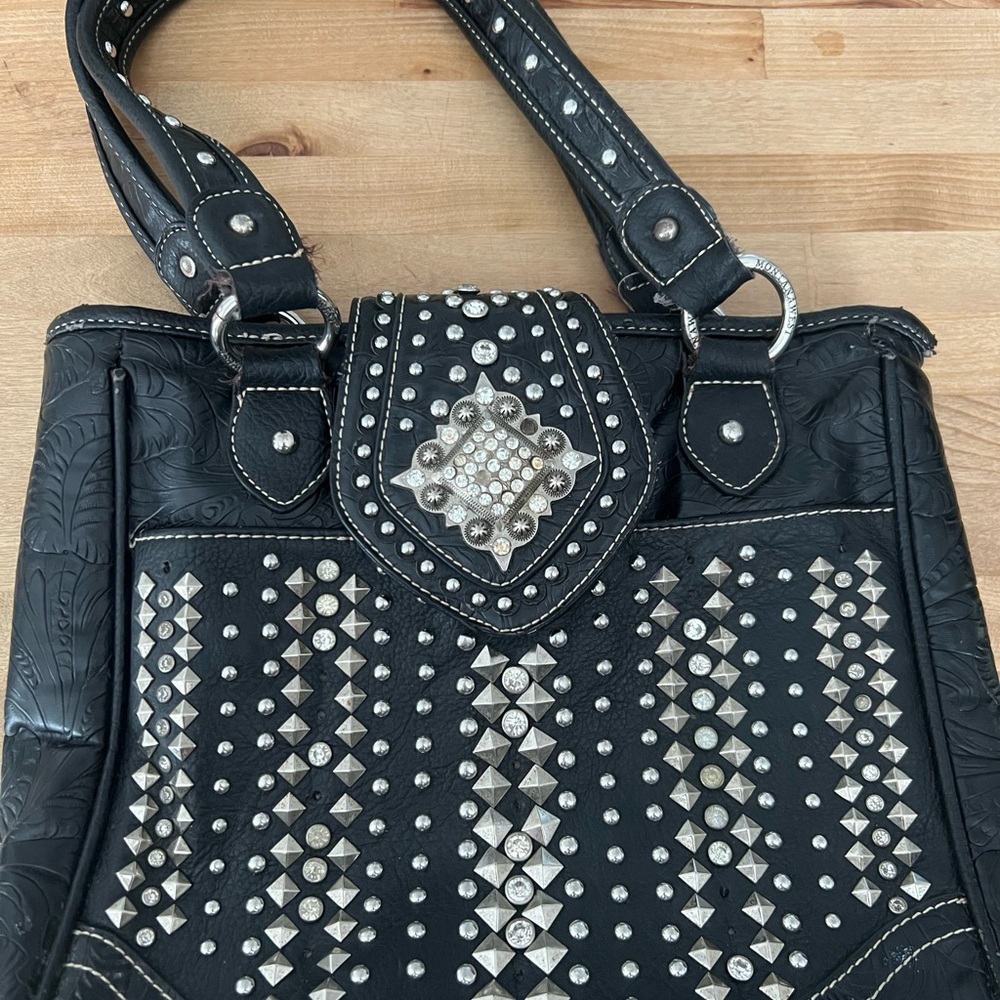 Montana West black tooled leather concealed carry bag